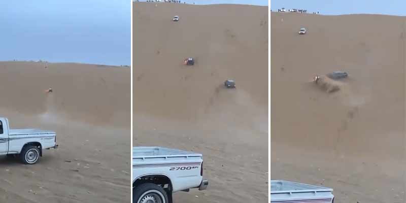 Apagando un coche en llamas en el desierto con la arena