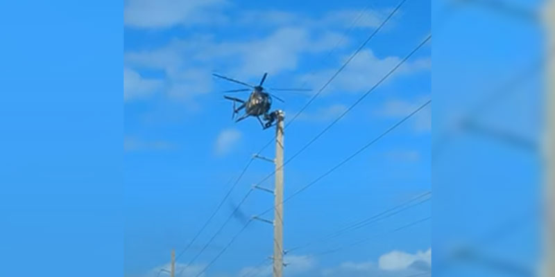 Reparando el tendido eléctrico desde un helicóptero